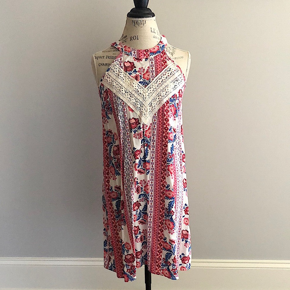Boutique dress in pink/blue/white, size small.